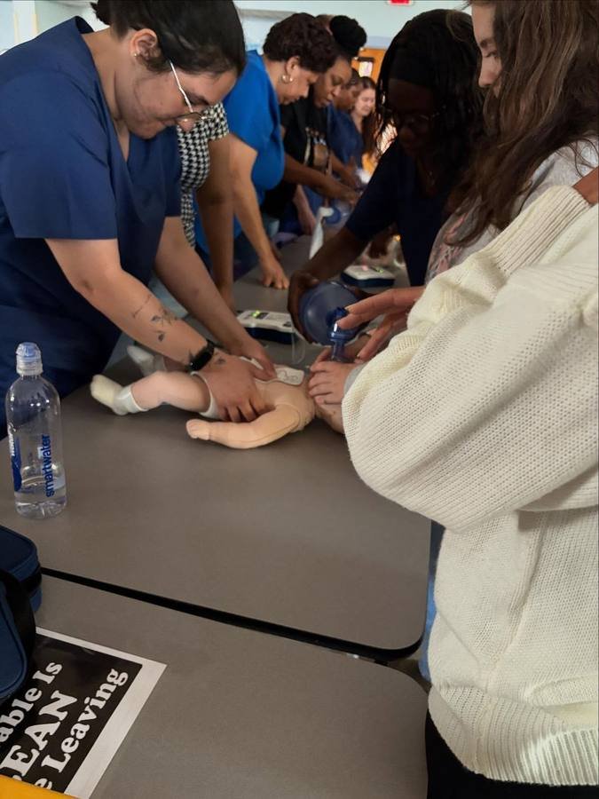 Students practicing hands-on emergency response skills